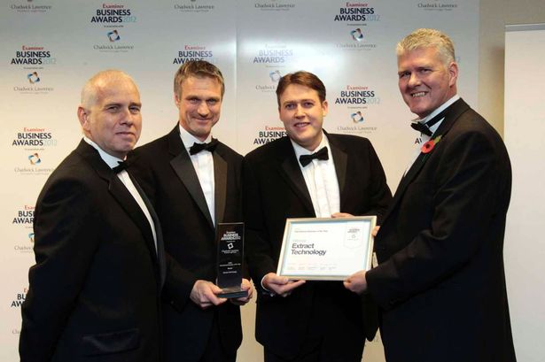 David Menaghan (right), of HSBC, presents the 2012 International Business of the Year award to (from left) Paul Hudson, Alan Wainwright and Jason Armitage, of Extract Technology